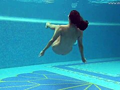 Sazan, the stunning European MILF, takes erotic underwater footage